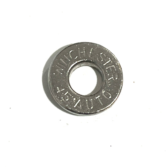 A single deprimed Winchester 45 Auto nickel spent case slice centered on a clean white background.