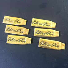 Load image into Gallery viewer, Flattened 223 Brass Bullets w/ Bullet and Plume Engraved Casings Qty 12