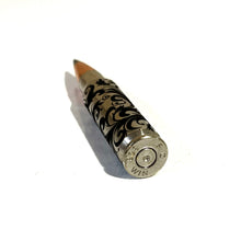 Load image into Gallery viewer, Close-up of the base of an inert Baroque engraved bullet casing, clearly showing the spent primer for safety verification