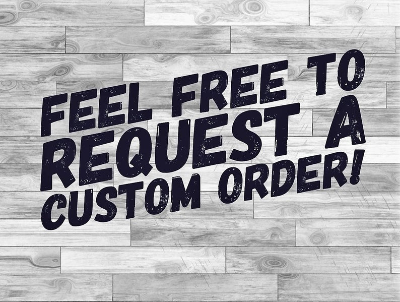 Custom order sign hand-lettered on paper, clipped to a wood board