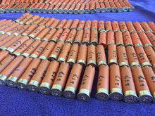 Load image into Gallery viewer, Empty Shotgun Shells Orange Hulls 12 Gauge Spent Once Fired 12GA Monarch Ammo Crafting Jewelry Boutonnieres Corsages Qty 22 Pcs