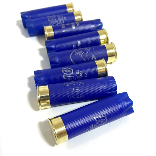 Seven blue Rio 12 gauge shotgun shell hulls on a white background showing "1250 fps 7.5 2 3/4 in" markings