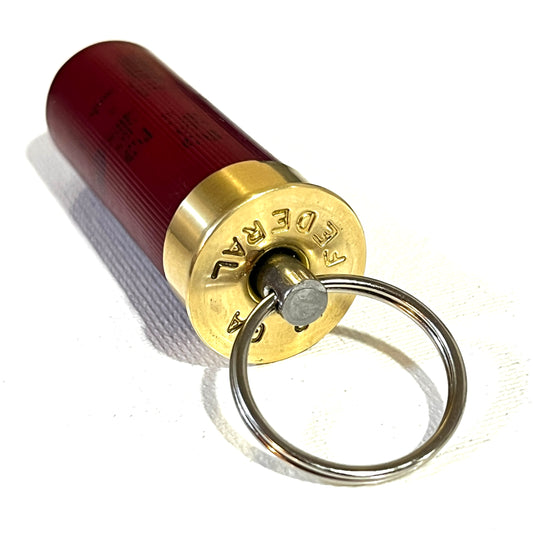 12 gauge shotgun shell keychain featuring a red Federal hull, gold metallic base, and stainless steel swivel ring.
