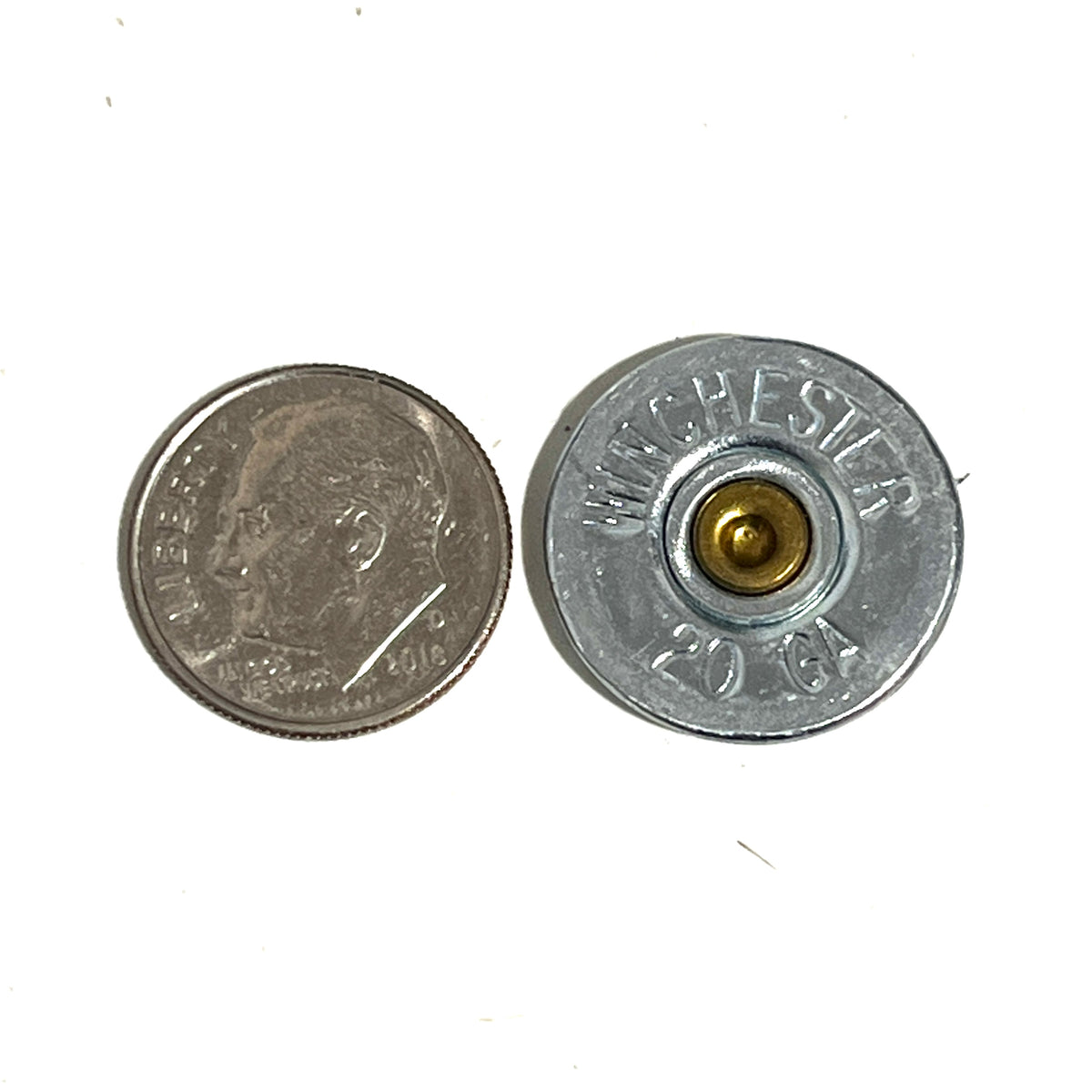 Winchester 20-gauge shotgun shell bullet slice next to a dime for size comparison and reference