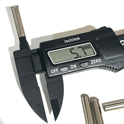 Digital caliper measuring the diameter of a nickel .22 caliber spent shell inside case hole dimensions at 5.7 mm