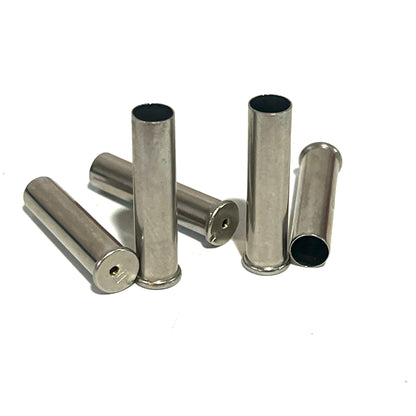 5 empty nickel .22 caliber spent shells with drilled holes through the headstamp, scattered on a white background