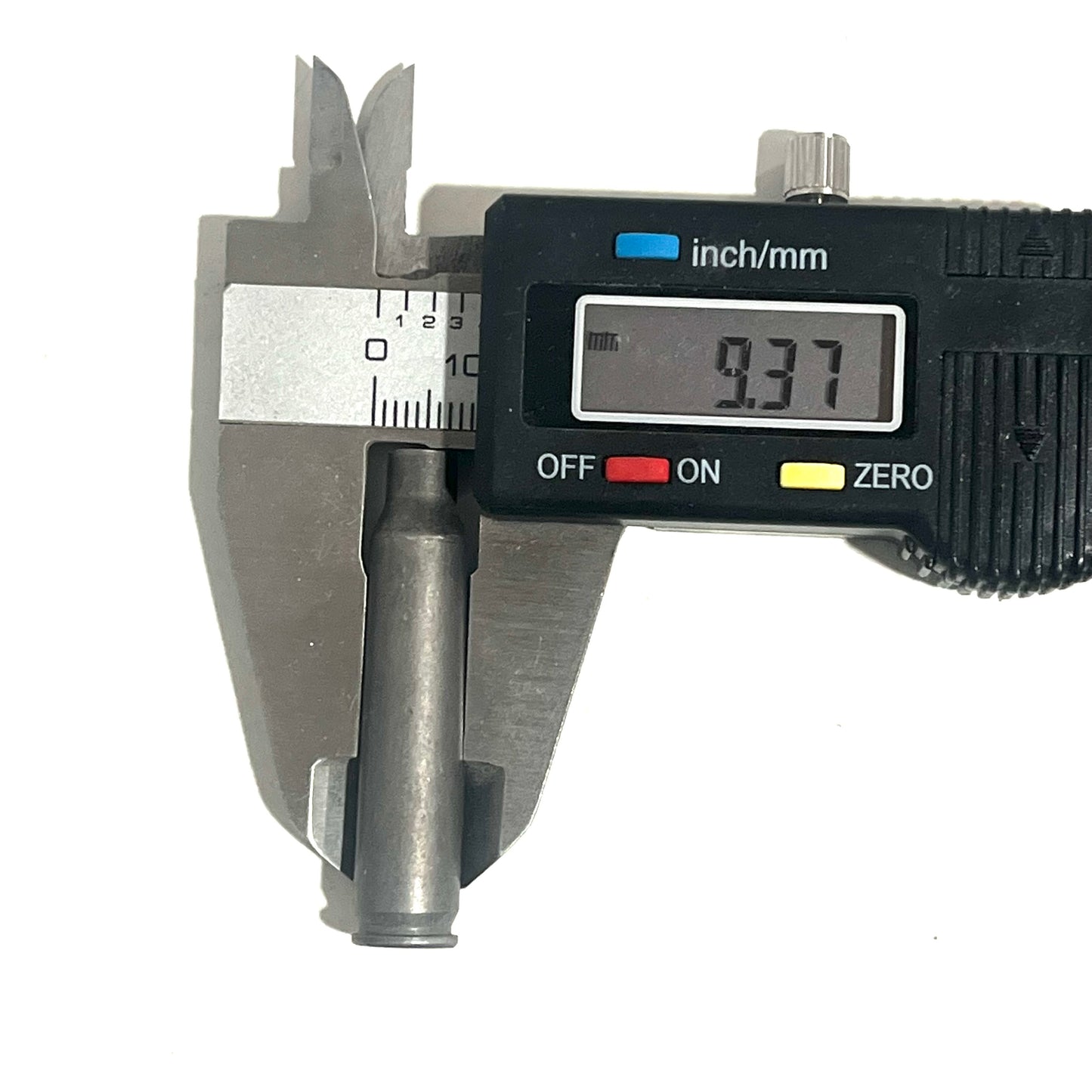 Digital caliper measuring the diameter of a gray steel .223/5.56 casing body at 9.37mm