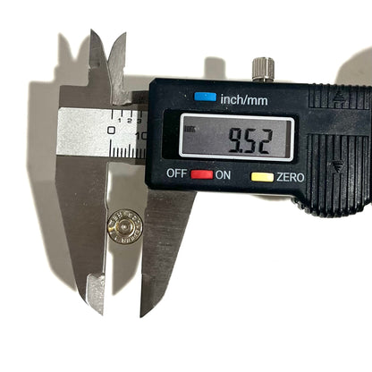 Digital caliper measuring the height of a 223 5.56 bullet slice showing 9.52 mm