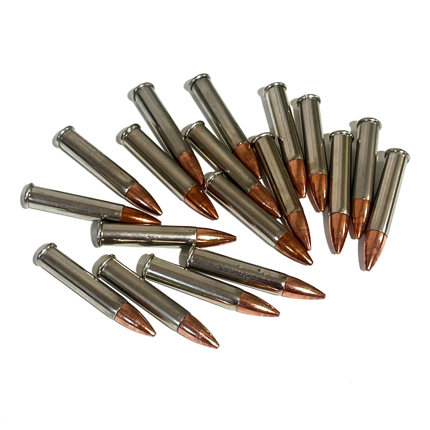 15 .22 Magnum nickel dummy rounds with copper bullets fanned out on white background