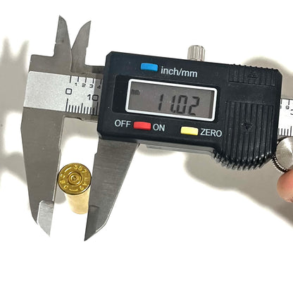 Digital caliper measuring a 357 Magnum brass case length at 11.02 mm