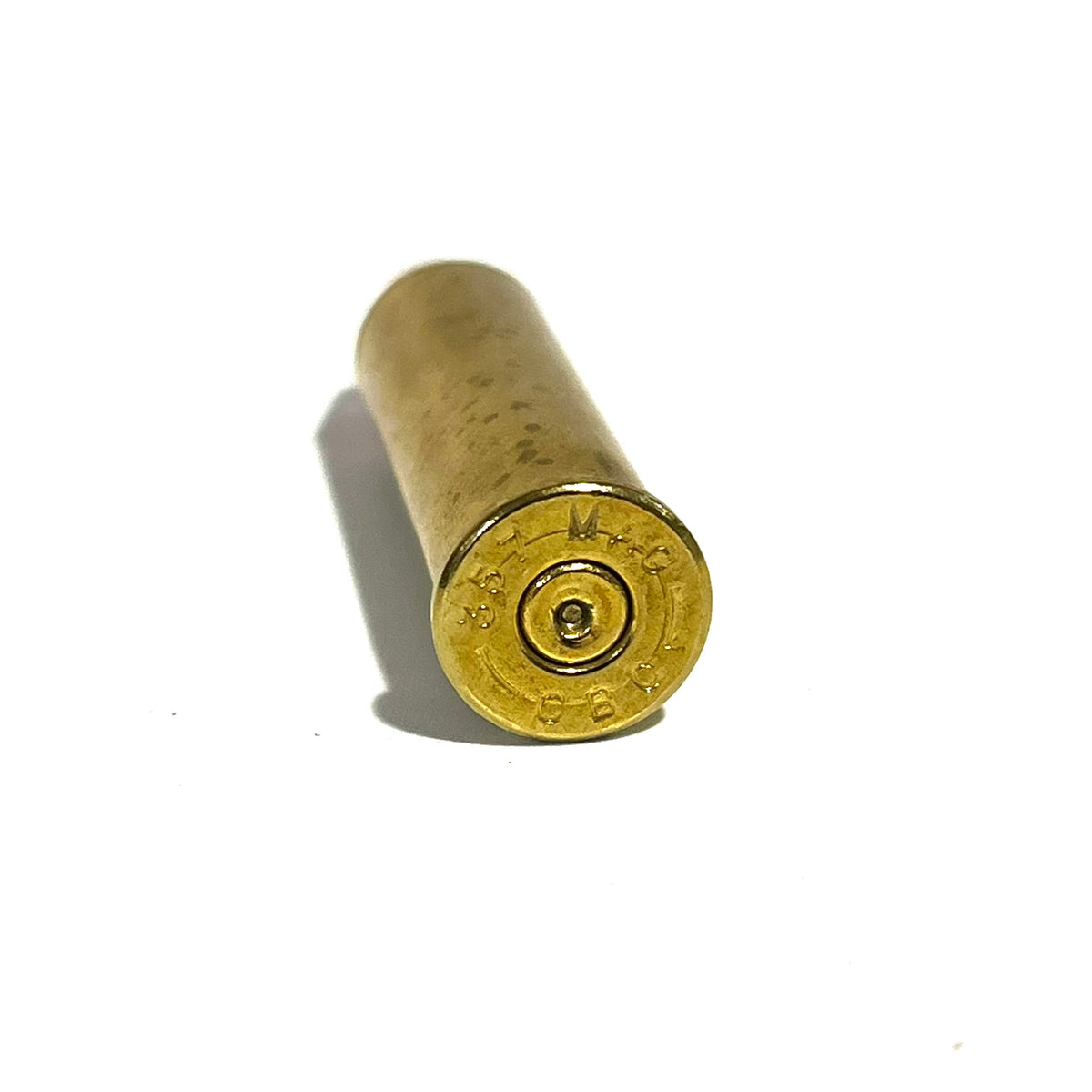 Close-up of a 357 Magnum brass case headstamp