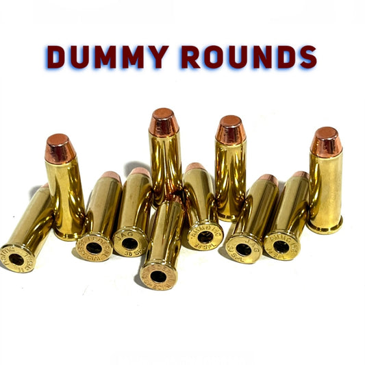12 brass 38 Special dummy rounds with flat nose bullets, standing upright under a Dummy Rounds text banner