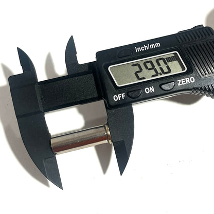 Digital caliper measuring a silver 38 Special casing, display reading 29.0mm, on a white background.
