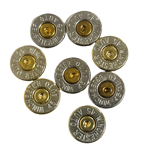 8 nickel 45 ACP bullet slices with gold primers, engraved Winchester 45 Auto headstamps, arranged in a circle