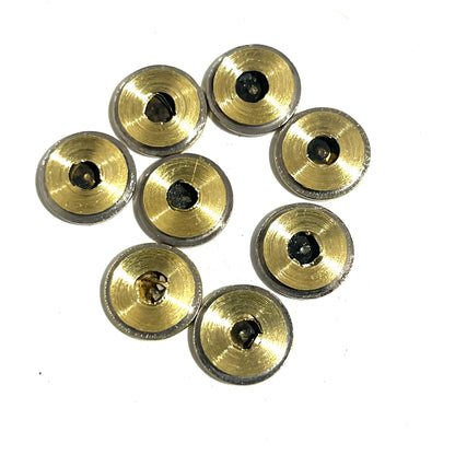 8 nickel 45 ACP bullet slices viewed from the reverse side showing brass primer pockets