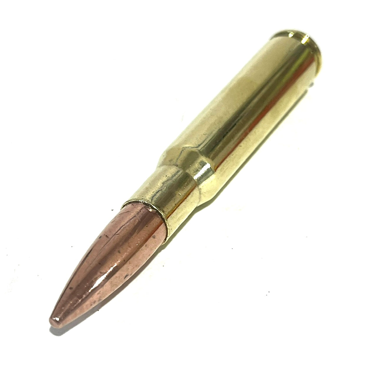50 Cal closeup polished brass with projectile
