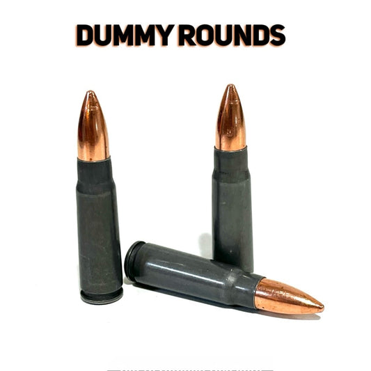 Three steel 7.62x39 dummy rounds with copper-tone bullets displayed under a Dummy Rounds title graphic.