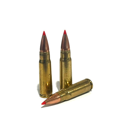 3 brass 7.62x39 dummy rounds with red-tipped bullets standing upright on a white background