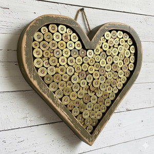 Heart made from headstamps for wall art decor inspiration