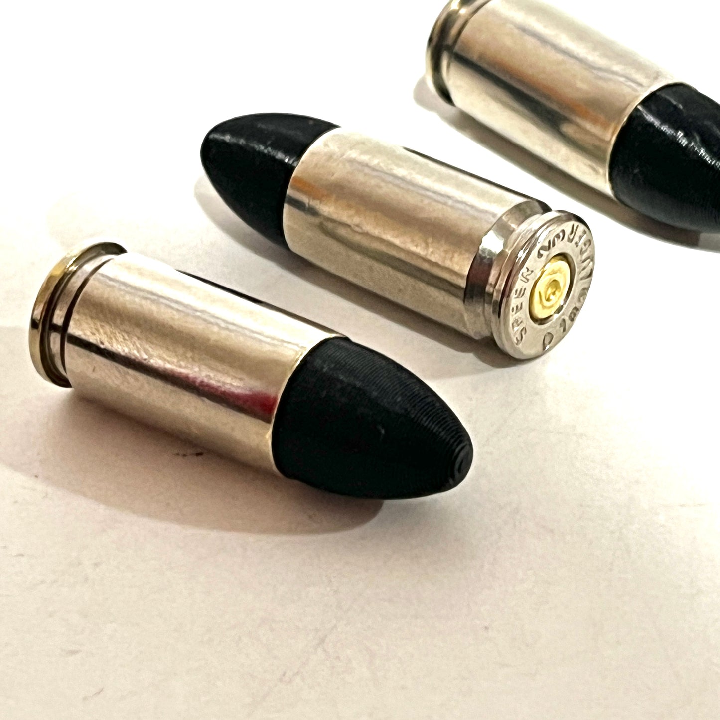 Fake Nickel 9MM Luger Real Once Fired Brass Casings With New Black Bullet
