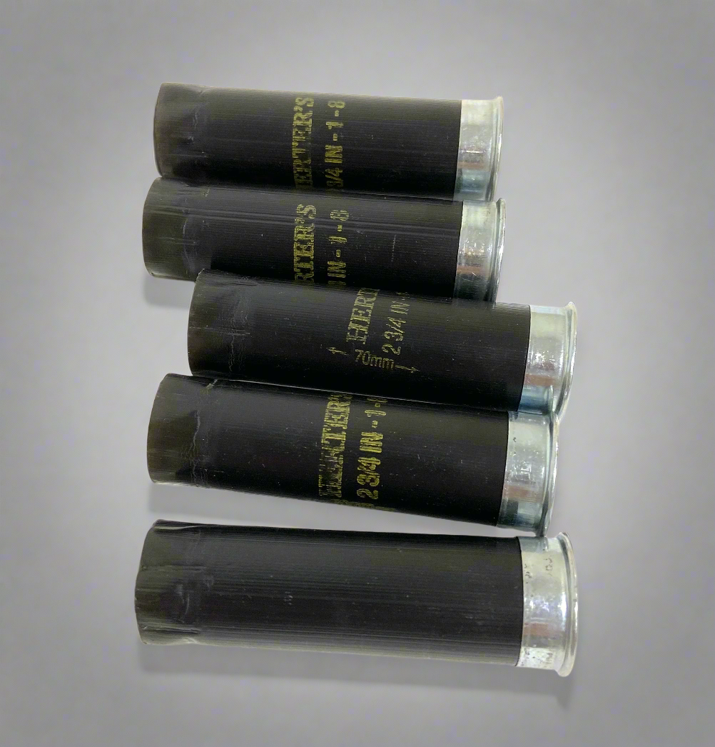 Upcycled black Herter's 12GA shotshell hulls ready for rustic farmhouse decor and shotgun shell wreaths.