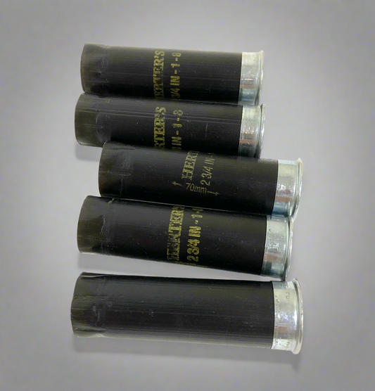 Upcycled black Herter's 12GA shotshell hulls ready for rustic farmhouse decor and shotgun shell wreaths.