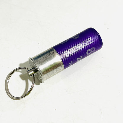 Purple Bornaghi 12 gauge once-fired shotshell keychain with swivel pin and steel split ring on a white background