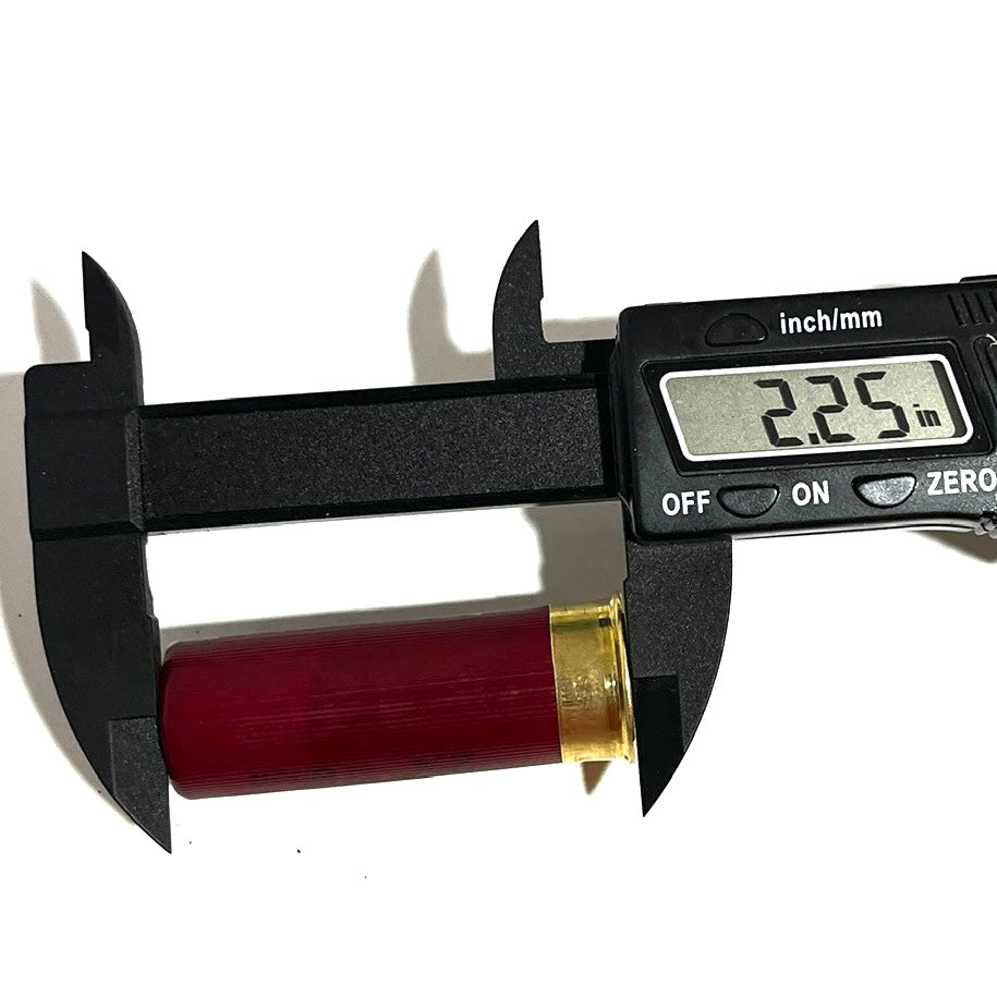 Dark red Federal 12 gauge dummy shotgun shell measured with digital calipers showing 2.25 inch length