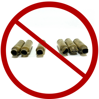 Six uncleaned 223 5.56 brass casings on a white background overlaid with a large red prohibition circle and slash symbol.