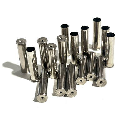 Drilled 22 Winchester nickel spent cases  for bullet jewelry arranged on a plain white background.