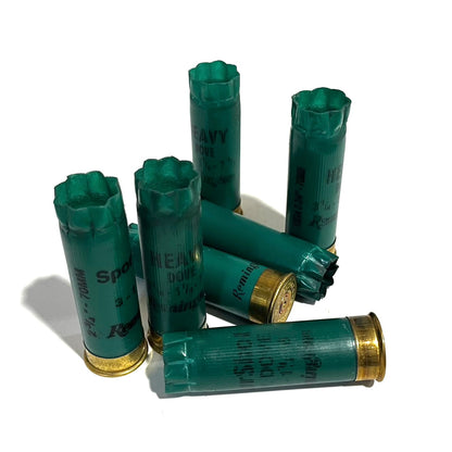 empty shotgun cartridges green
