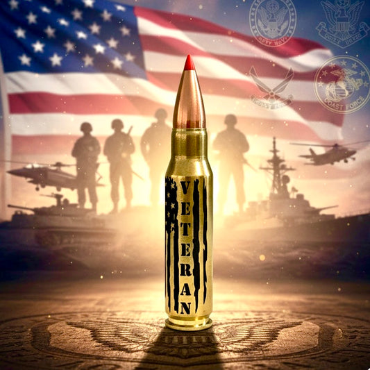 Engraved brass .308 WIN round with red tip, VETERAN text in flag lettering over a patriotic backdrop
