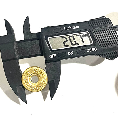Gold Fiocchi 12 gauge deprimed casing bottom measured with a caliper reading 20.1mm in diameter.