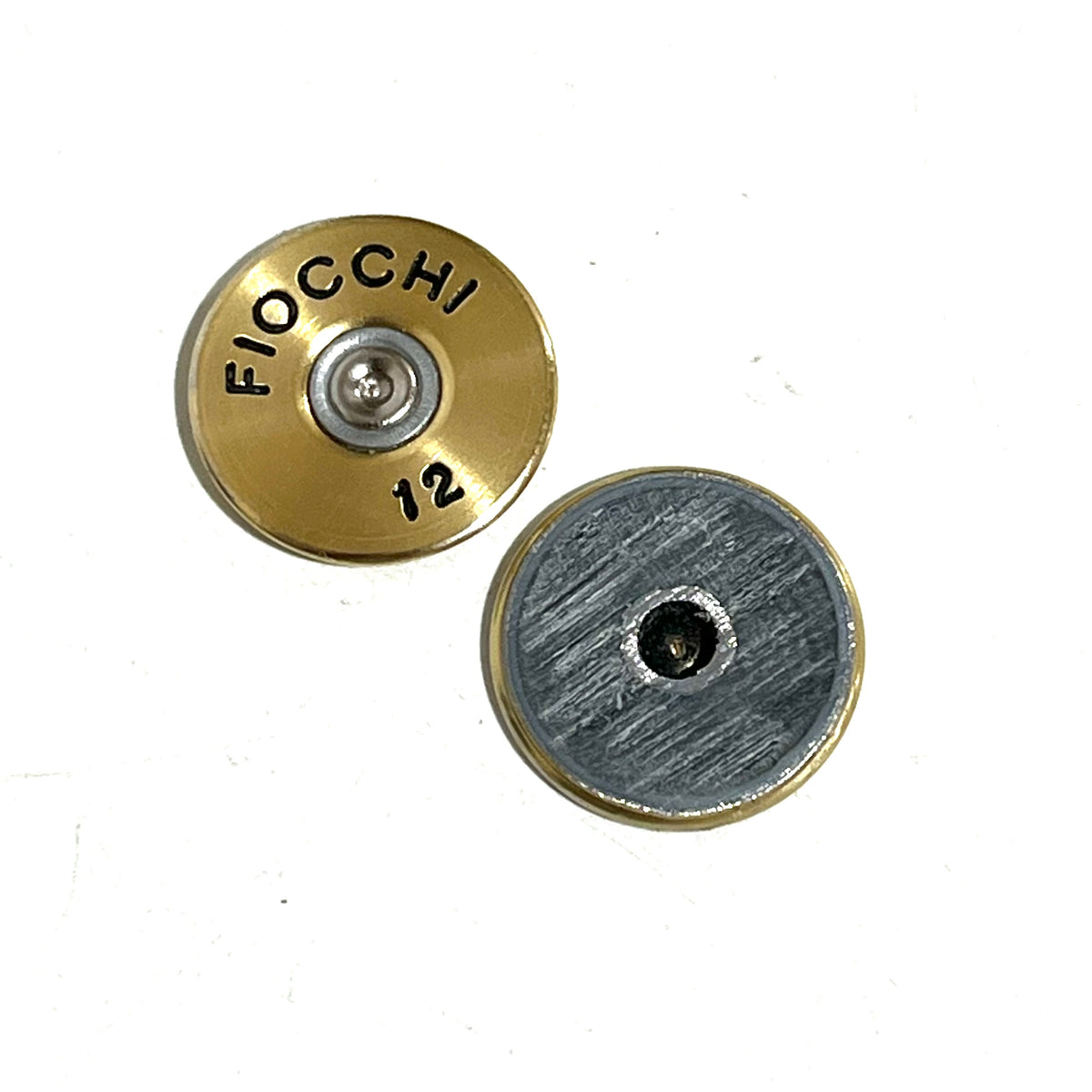 Gold Fiocchi 12 gauge shell slice beside a flipped slice showing its gray brushed reverse and open center