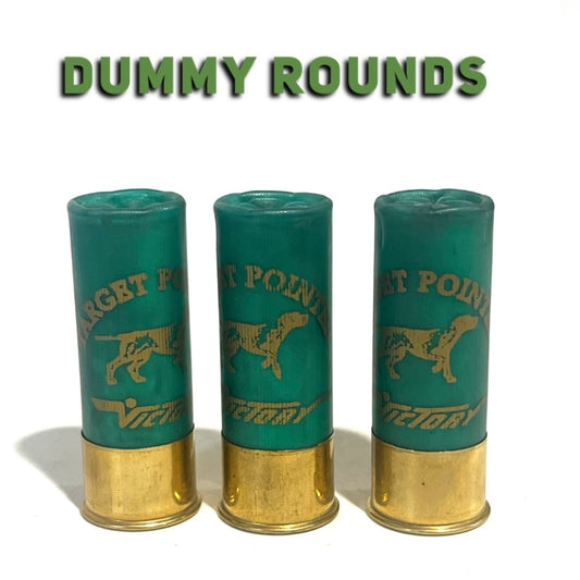 Three green Victory 12 gauge once-fired dummy rounds with gold bases and a Target Pointer dog design