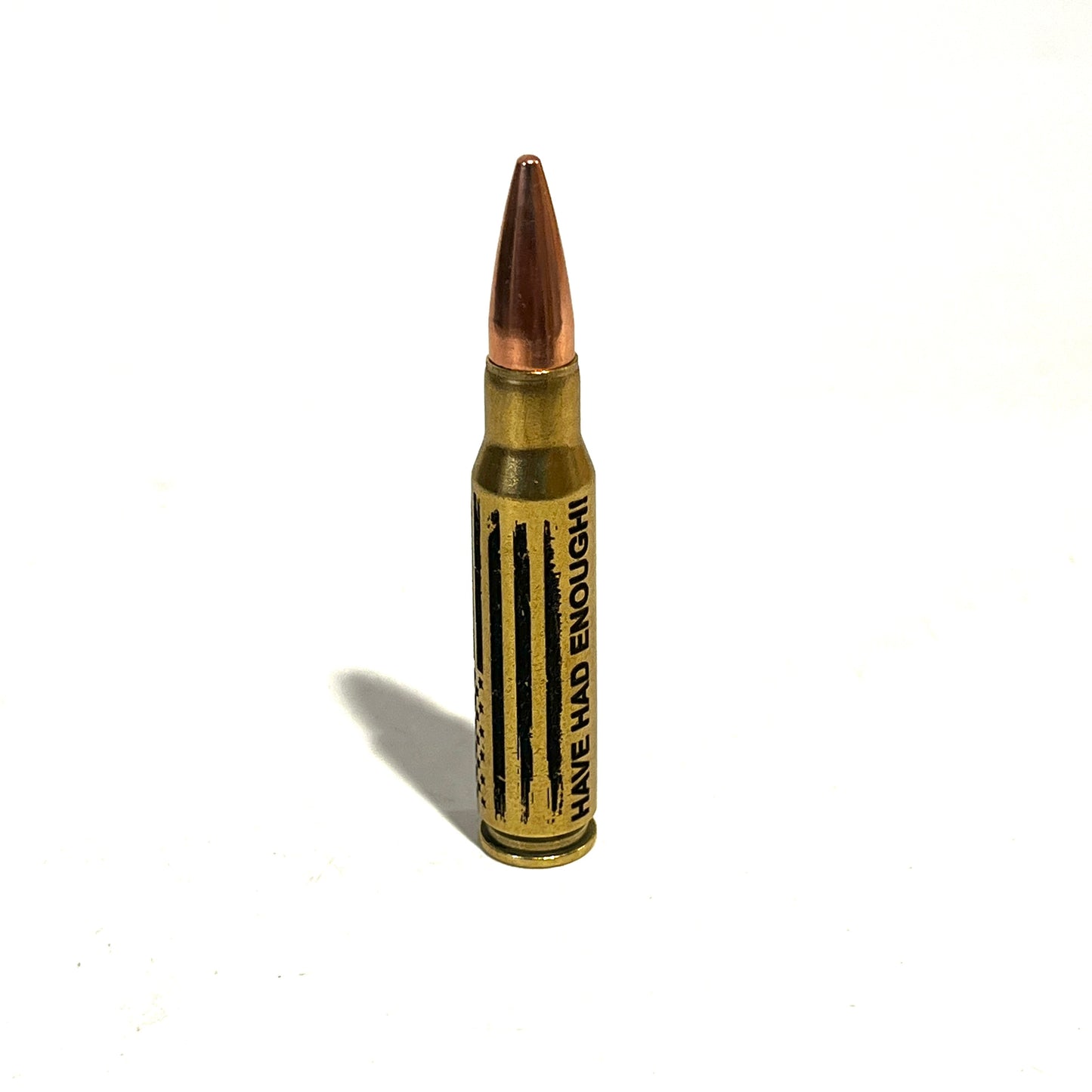 .308 Winchester dummy round with HAVE HAD ENOUGH script and distressed American flag engraved on the brass casing.
