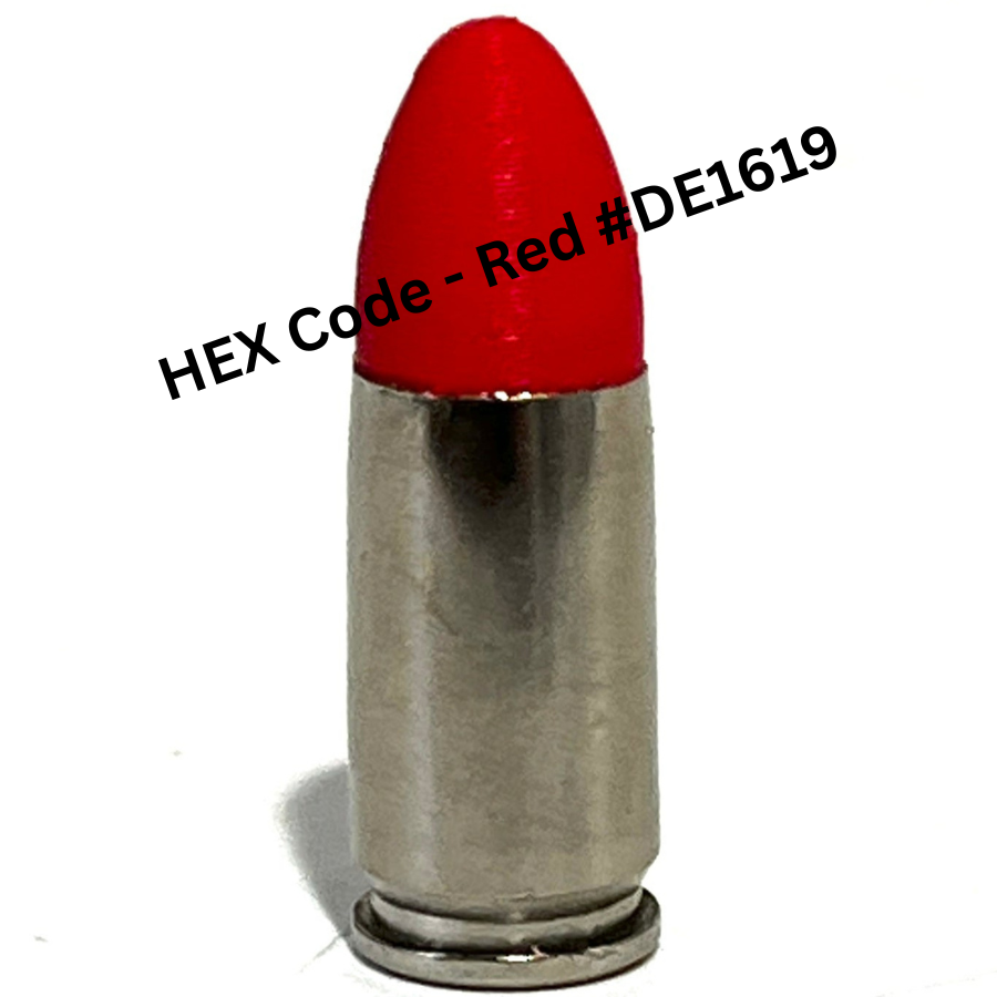 Single fake nickel 9mm Luger dummy round with red painted tip on white background, text overlay reads HEX Code Red hashtag DE1619