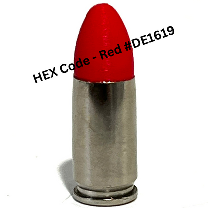 Single fake nickel 9mm Luger dummy round with red painted tip on white background, text overlay reads HEX Code Red hashtag DE1619