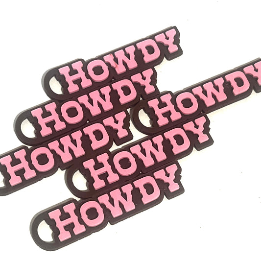 6 pink and brown HOWDY keychain charms with bottle opener ends arranged diagonally on white background