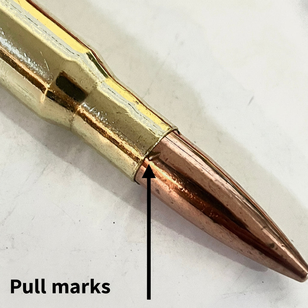 macro-50-bmg-projectile-pullmarks-pointed out with text PULL MARKS