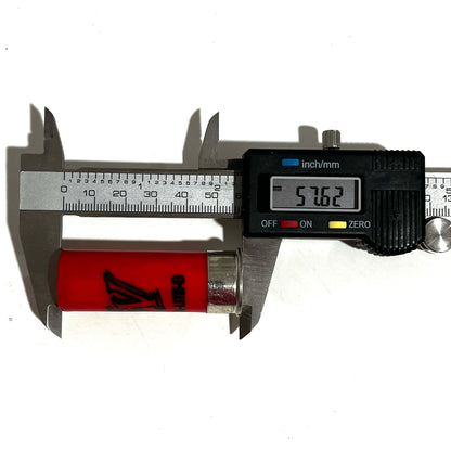 A digital caliper measuring the total length of a red fake shotgun shell against a white background.
