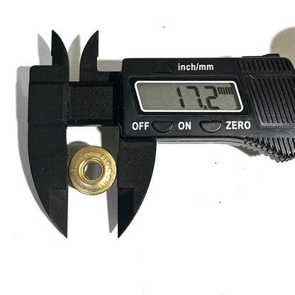 Digital caliper measuring the diameter of a Fiocchi 28 gauge shotgun shell slice at 17.2 mm