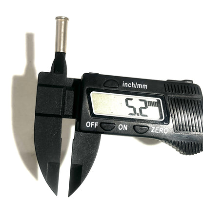 Digital caliper measuring the diameter of a nickel 22 caliber casing showing 5.2 mm