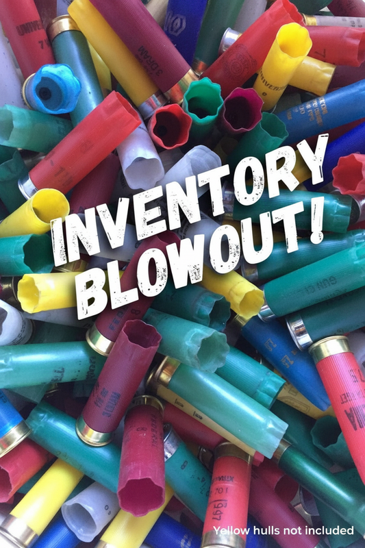 Mixed-color inert 12 gauge shotgun shells for crafts (no powder or live primers). Center text reads: 'INVENTORY BLOWOUT