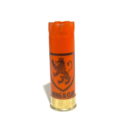 Orange Monarch Wing & Clay 12 gauge shotgun shell with a lion crest logo, standing upright on a white background