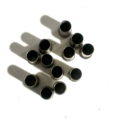 12 nickel 22 caliber empty casings viewed from directly above showing open ends