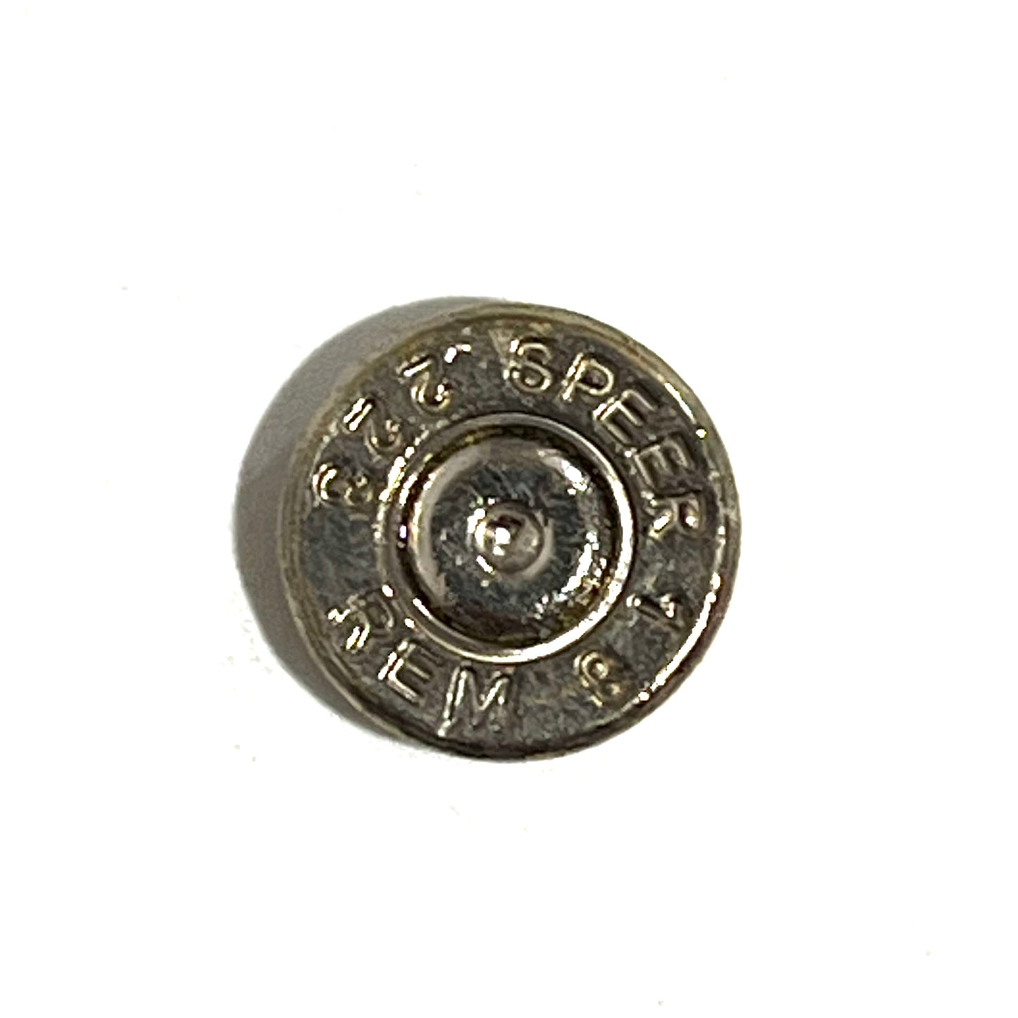 Close-up of one polished nickel 223 5.56 bullet slice showing Speer Rem headstamp markings