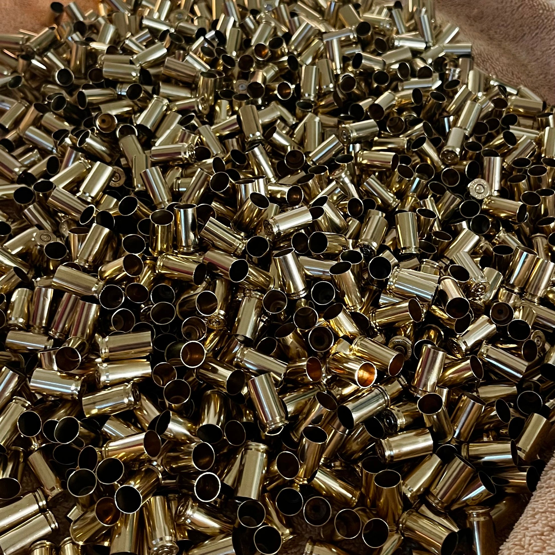 Large bulk pile of cleaned polished empty 9mm brass shell casings