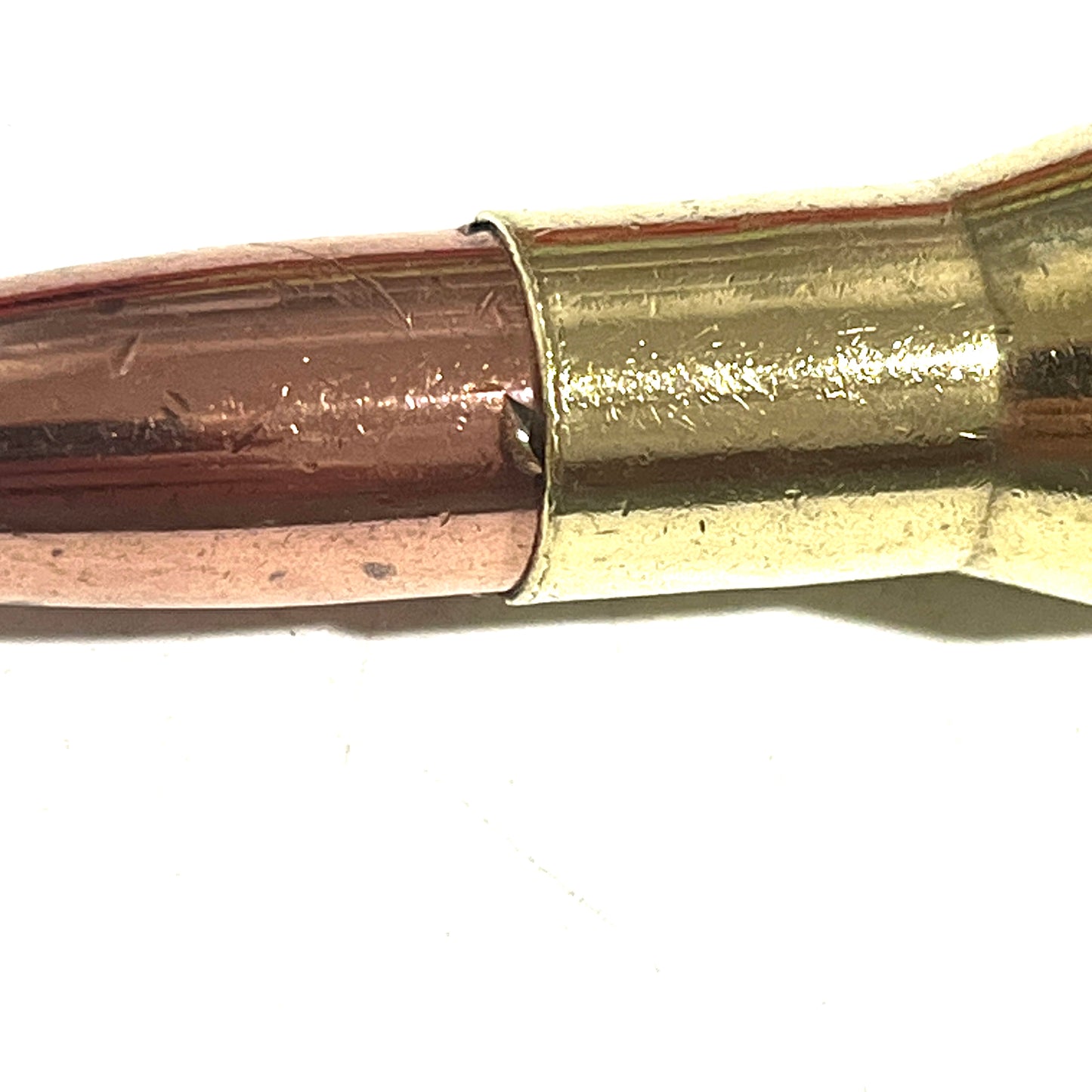 Close up of projectile with authentic pull marks.