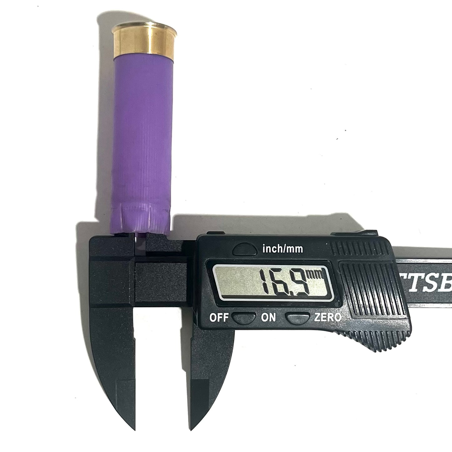 Digital caliper measuring the diameter of a purple 16 gauge shotgun shell hull at 16.9 mm